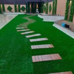 تركيب عشب صناعي بحائل