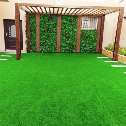 تركيب عشب صناعي بحائل