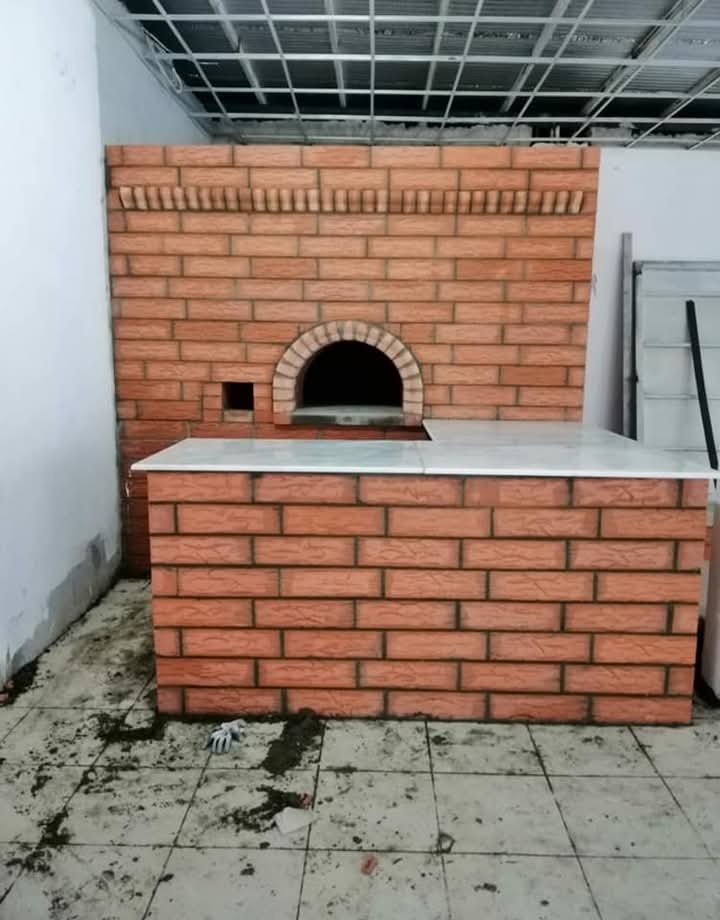 معلم بناء فرن بيتزا بحائل
